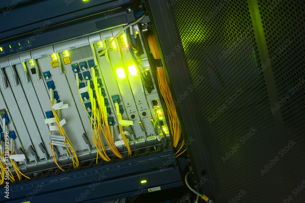 fiber optic with servers in a technology data center fiber optic with servers in a technology data center