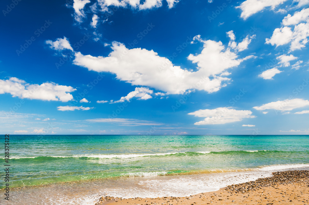 Beautiful beach and blue sky with clouds.