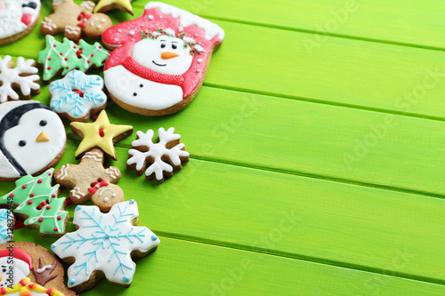 Christmas cookies on a green wooden table