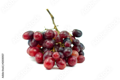 bunch of small red grapes isolate on white background
