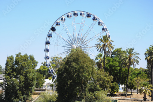 Large ferris wheel against blue sky