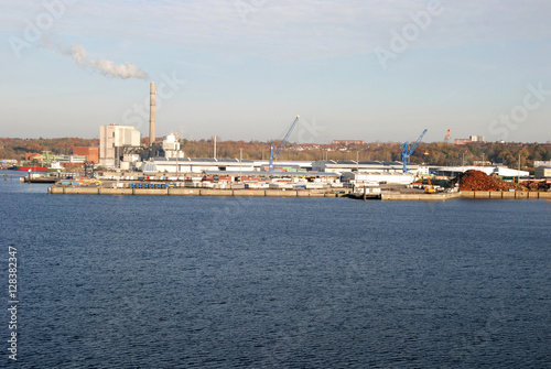 industrial plant by the harbor, ship yard and construction site by the shipping port, bulk carrier receiving terminal