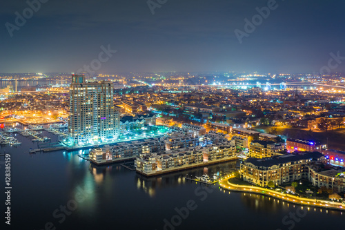 Aerial view of Federal Hill and the Inner Harbor at night  in Ba