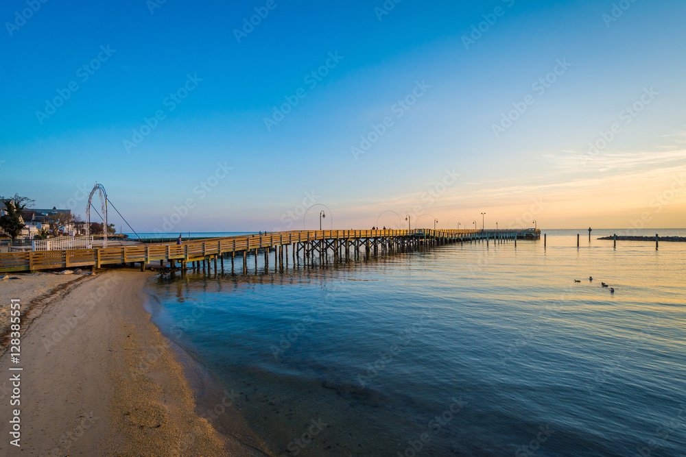 Fishing pier and the Chesapeake Bay at sunrise, in North Beach,