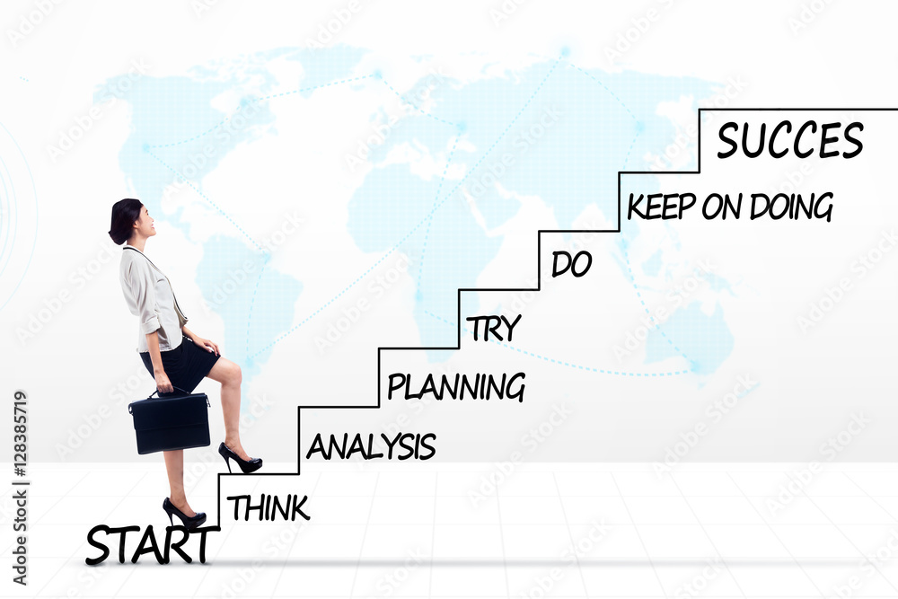 Asian businesswoman with strategy plan on stairs