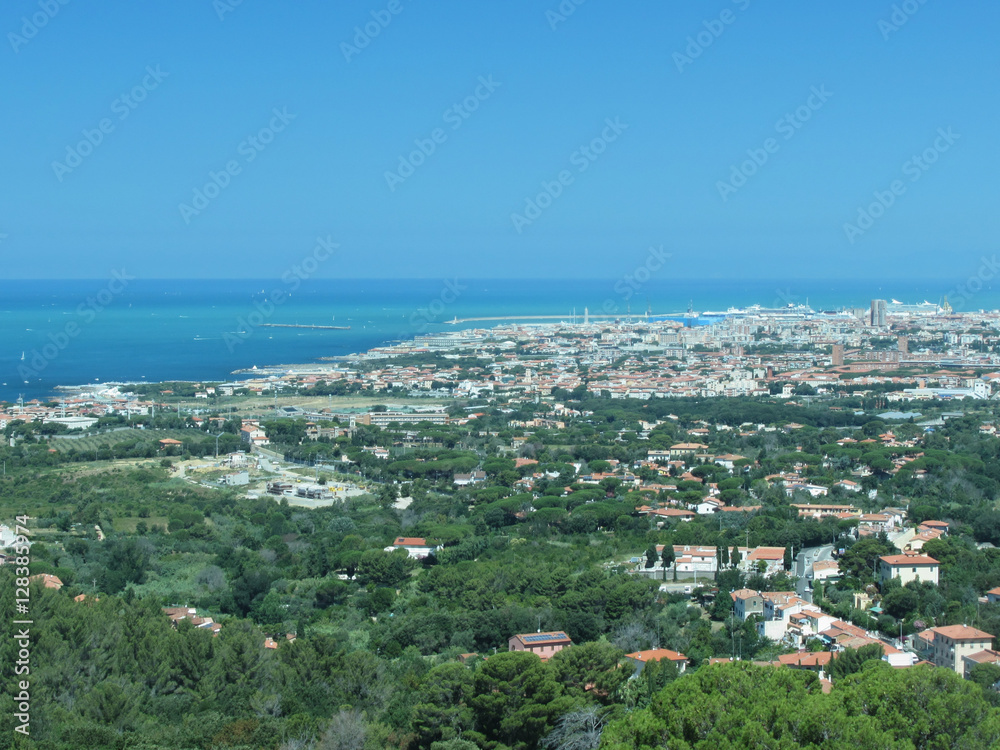 Spectacular aerial panorama of Livorno city made from the nearby hills of Montenero on sunny day, Tuscany Italy . Photo taken with polarized filter