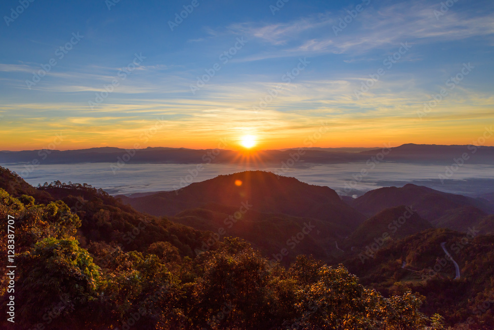 View of sun rise morning mist  at Doi Ang Khang mountain one of the famous mountains in Chiangmai,Thailand
