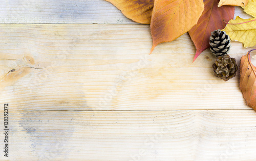 Fotografie Autumn fall leaves on rustic wooden table as sale email backgrou
