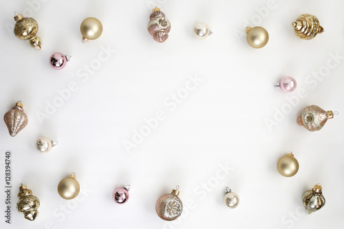 Fototapeta Naklejka Na Ścianę i Meble -  Pink and Gold Vintage Christmas Ornaments Flat lay composition for bloggers, magazines, social media and artists. Top view.