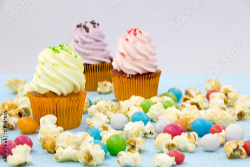 Party background with cupcakes and confetti