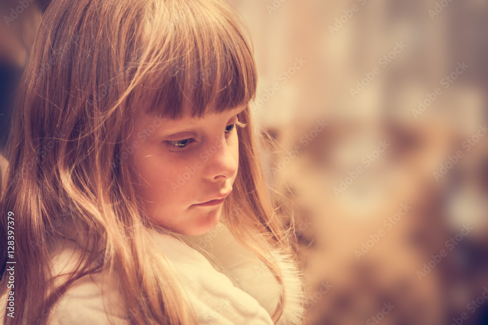 Lonely sad child with upset look Lonely sad child with upset look