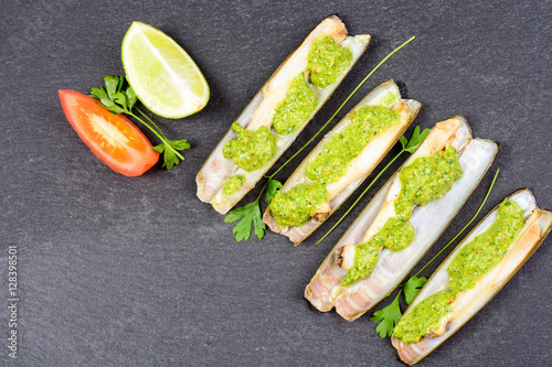 Razor clams - navajas - with green parsley pesto photo