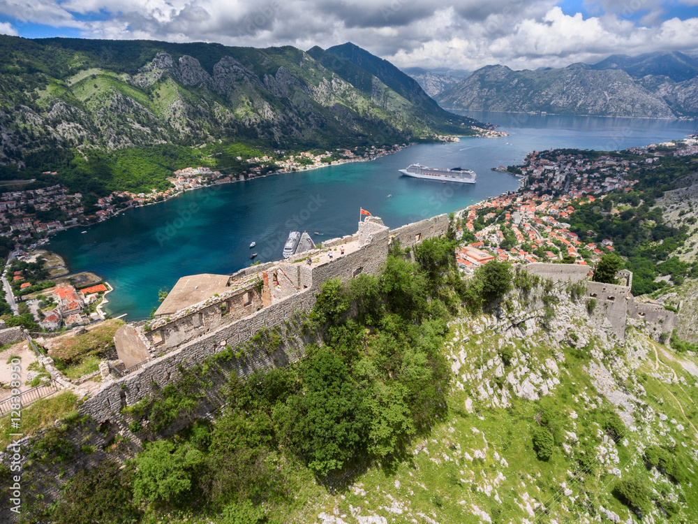 Rear view at the walls and ruins of castle St. John (San Giovanni) on top hill. Gulf of Kotor. View from drone. Montenegro