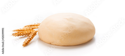 Dough with ears of wheat isolated on white background