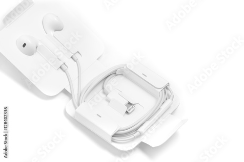 In-ear headphones white in special case with lightning Apple ada