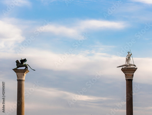 venetian symbols of St. Mark and St. Theodore over sky backgrou