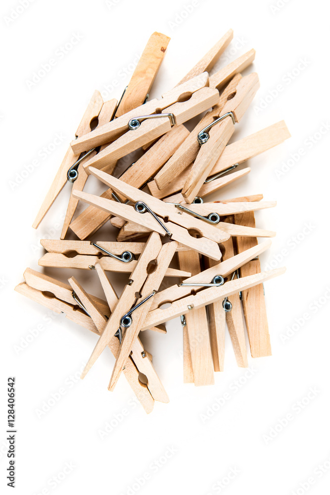 Pile of clothespins isolated on white background