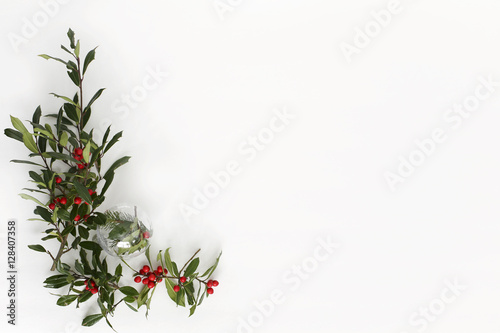 Christmas Holly Layflat Flat lay composition for bloggers, magazines, social media and artists. Top view.