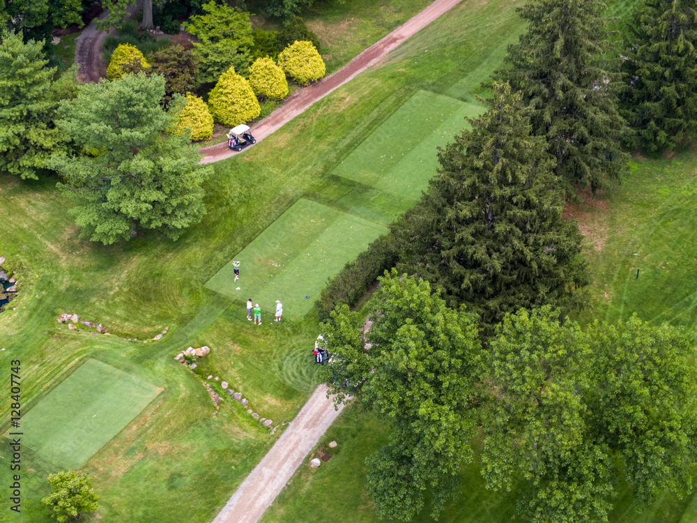 Aerial Photo of Men Teeing Off at a Golf Course