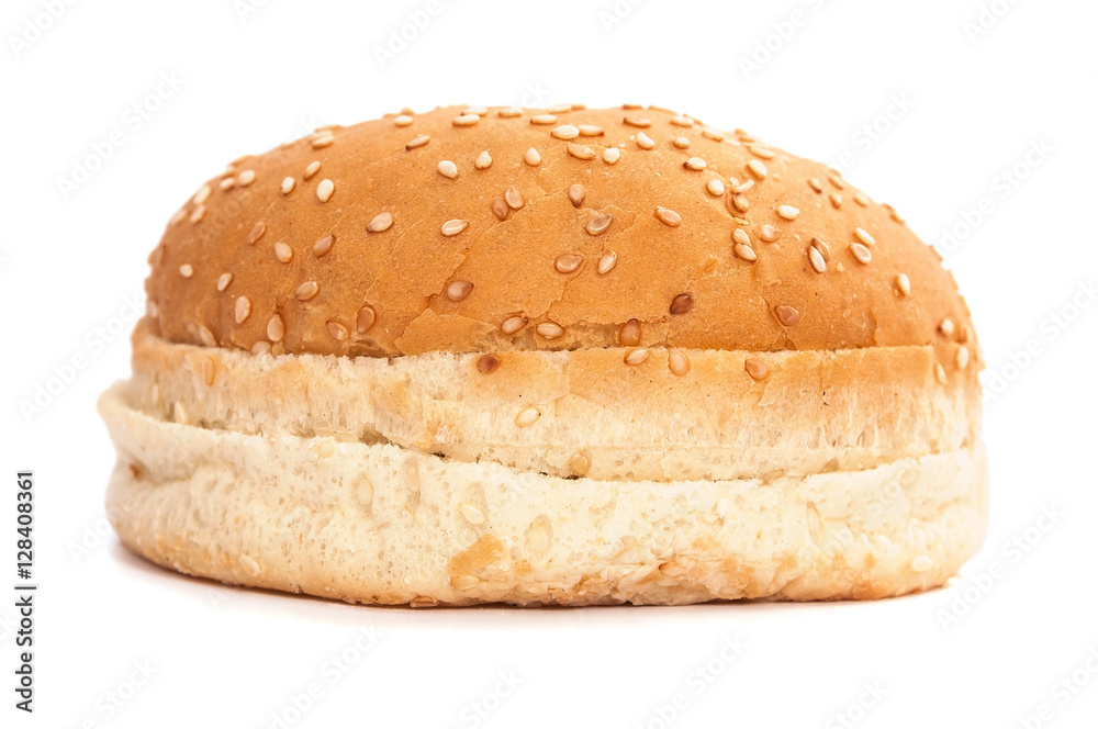 Burger bun with sesame seeds on white background Burger bun with sesame seeds on white background