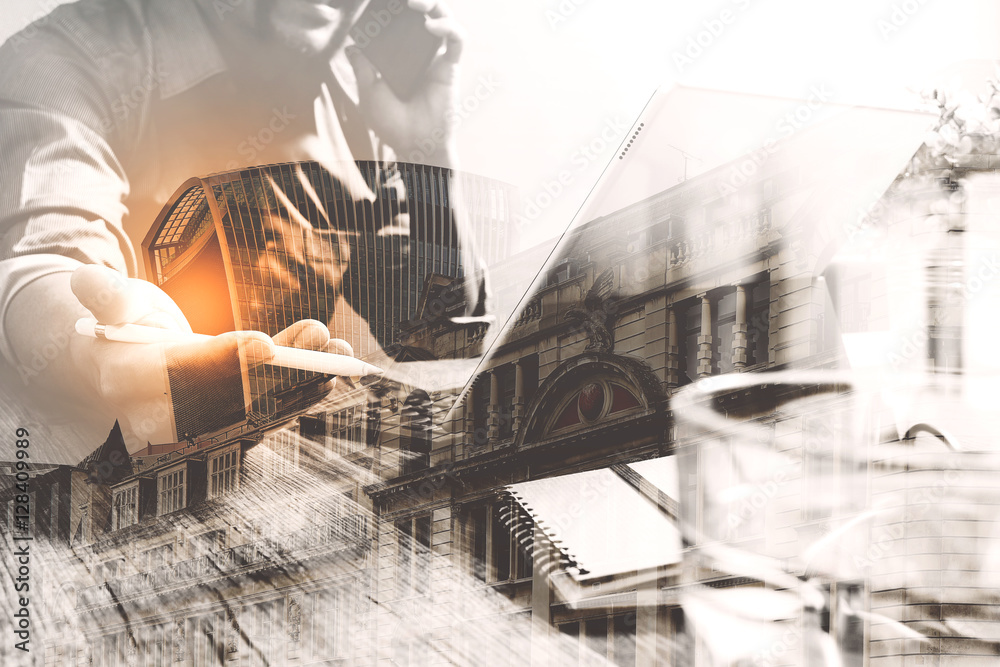 Fototapeta premium Double exposure of success businessman using stylus pen,digital