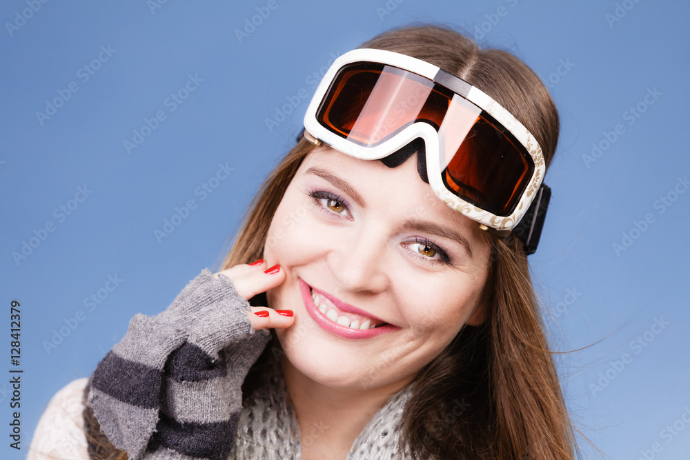 skier girl wearing warm clothes ski googles portrait. skier girl wearing warm clothes ski googles portrait.