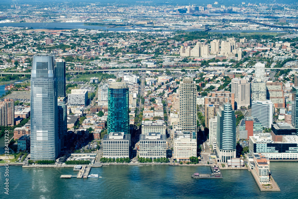 Obraz premium Aerial view of Jersey City in New Jersey on a beautiful day