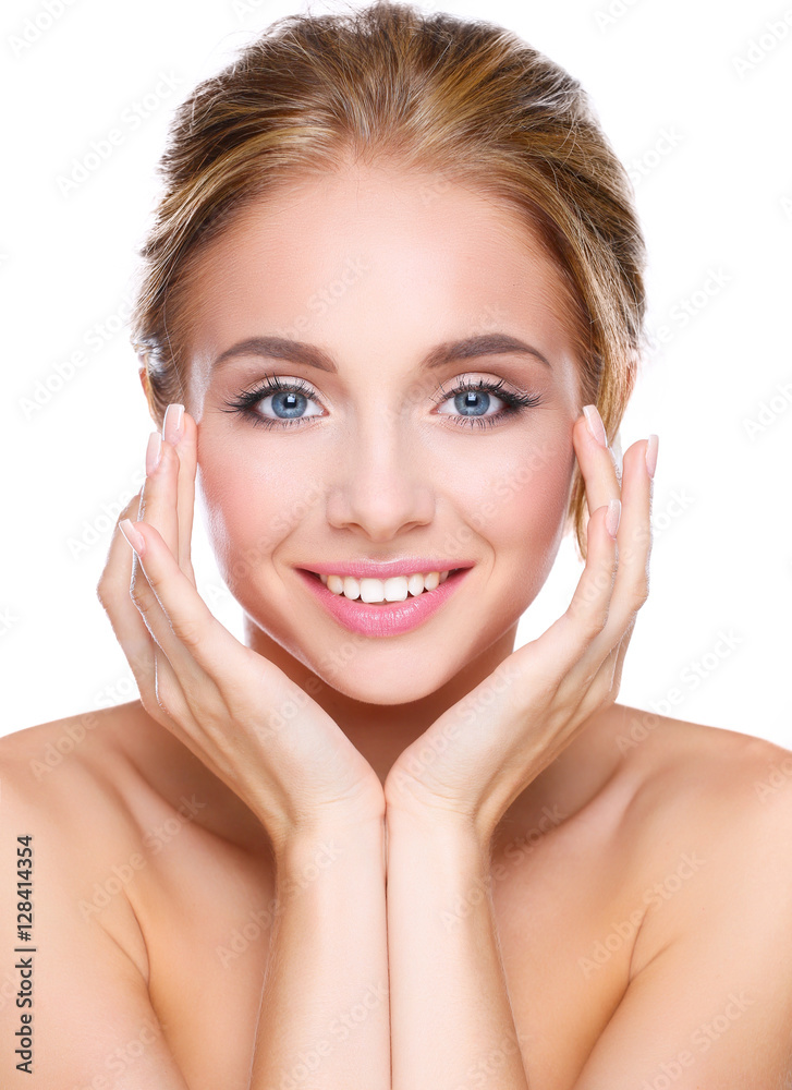 Young woman touching her face isolated on white background Young woman touching her face isolated on white background