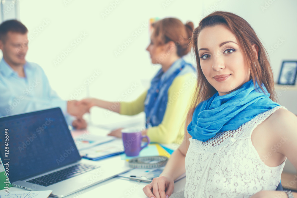 Portrait of attractive female designer in office Portrait of attractive female designer in office