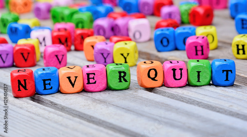 Fényképezés Never quit words on table