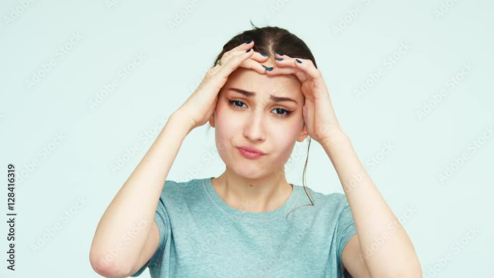 Headache. Portrait cute girl teenager 14 years old on white background Headache. Portrait cute girl teenager 14 years old on white background