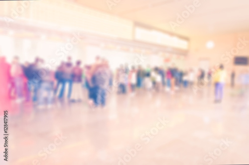 Blurred background : people queuing to buy a public transport au © weedezign