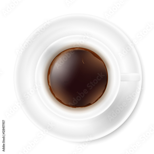 White cup of black coffee with foam and saucer.