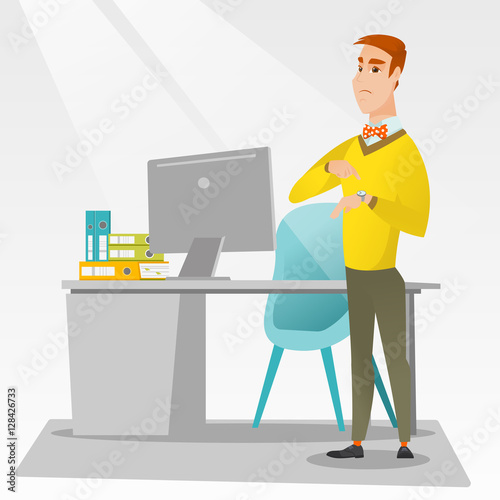 Angry businessman pointing at wrist watch.