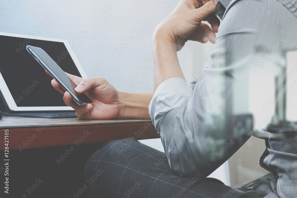 success businessman hand using eyeglass,smart phone,digital tabl success businessman hand using eyeglass,smart phone,digital tabl