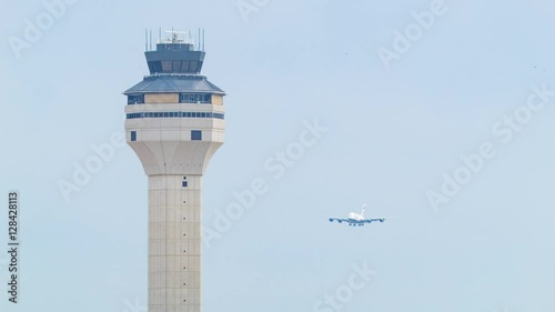 British Airways Airbus A380 Landing at Washington Dulles International Airport Wide Shot with Air Traffic Control Tower
