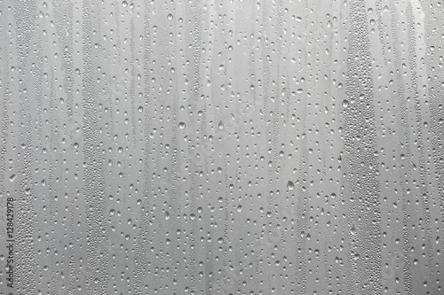 Closeup water condensation on window glass background