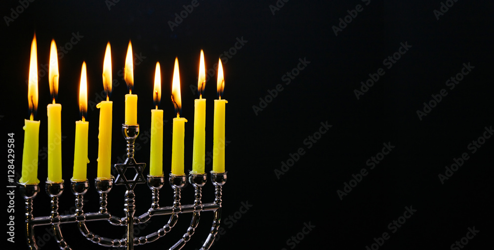 Fototapeta premium Jewish holiday hannukah with menorah traditional