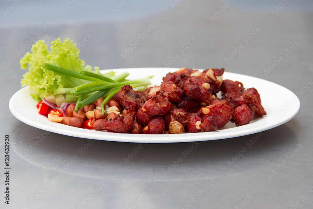 sour pork fried spare ribs on white dish sour pork fried spare ribs on white dish