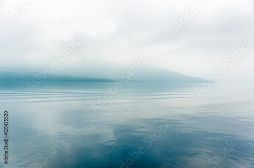 foggy blue lake 