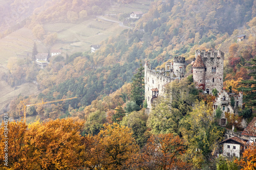Old castle Brunnenburg in the Alps mountains, Italy, South Tyrol