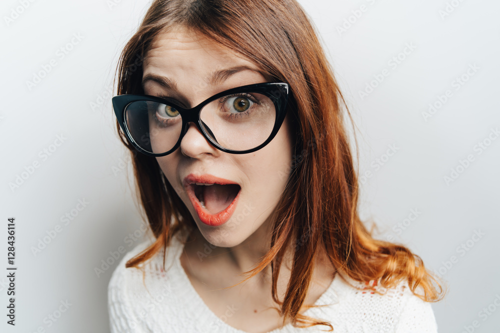 Obraz premium funny woman puffed cheeks. Woman close-up in funny sight 