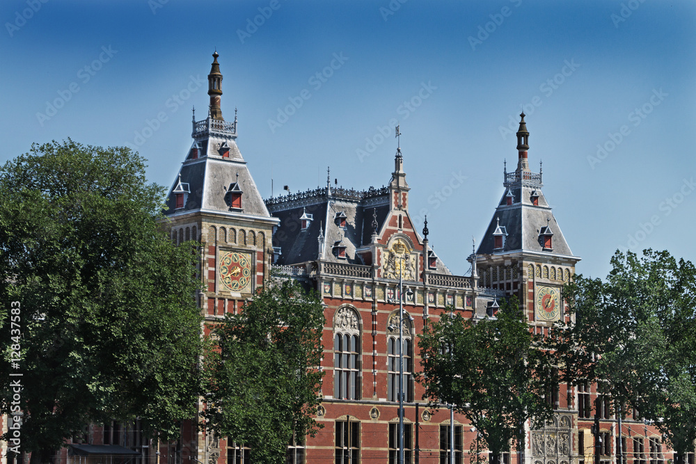 Brown castle on a background of blue sky in Amsterdam Brown castle on a background of blue sky in Amsterdam