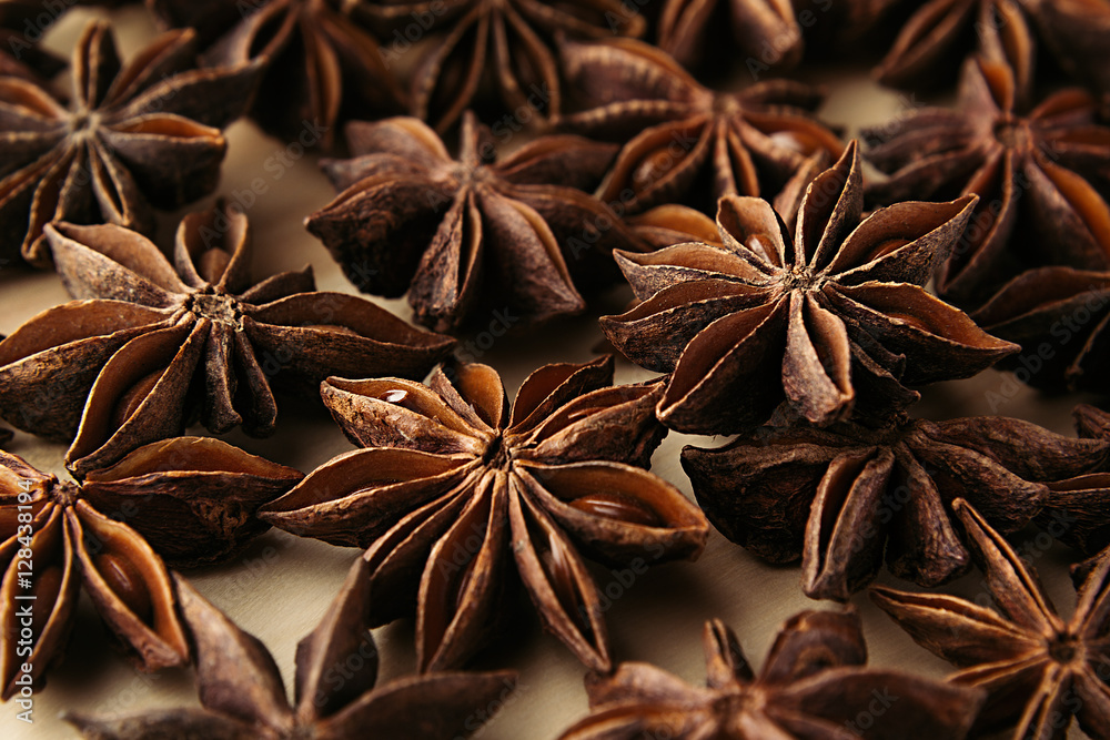 Anise star spice closeup background. Fragrant asian spices. Top view. Anise star spice closeup background. Fragrant asian spices. Top view.