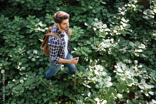 Male tourist in forest