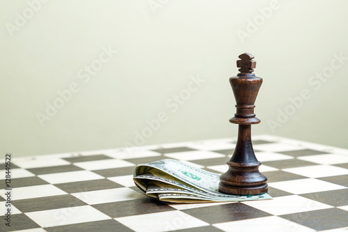 Chess figure the king with money