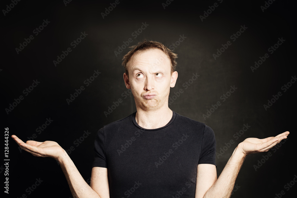 Man Thinking and showing his empty hands. Choice concept