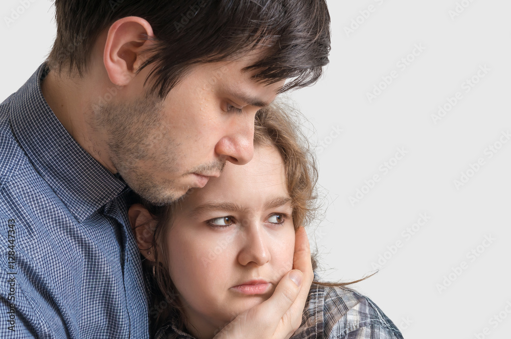 Young man is supporting his sad girlfriend. Young man is supporting his sad girlfriend.