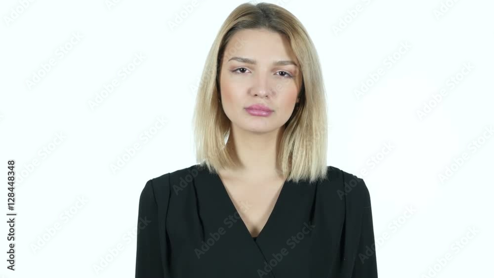 Thumbs Down By Young Woman, White Background Thumbs Down By Young Woman, White Background