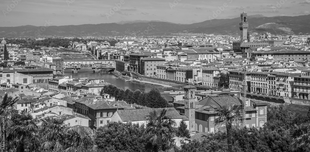 Florence, Italy- August 12, 2016: Cityscape of the city of Florence with the Ponte Vecchio overlooking the Arno River in Florence, Italy